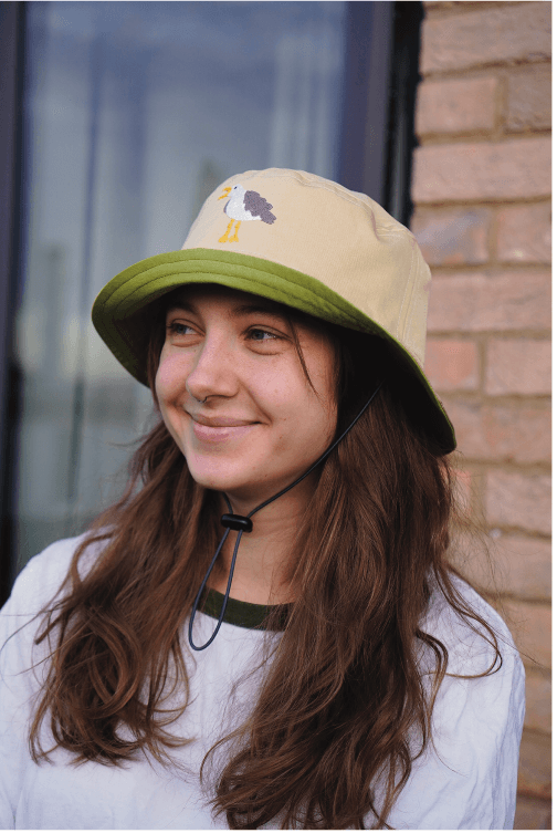 Polina wearing a Hat Dog bucket hat